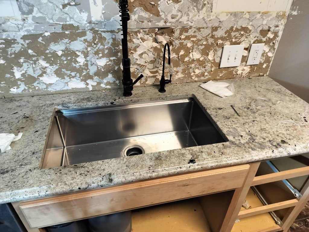 same countertop all new drawers and new faucet 