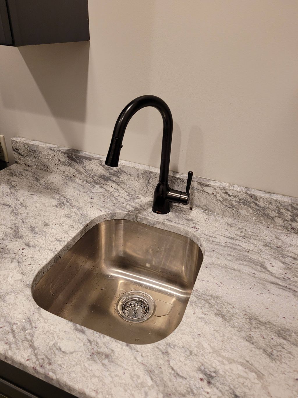 Bar sink on granite with oil rubbed bronze faucet