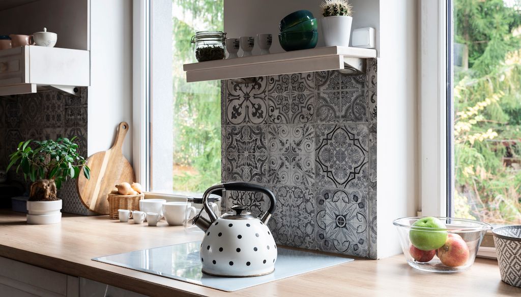 grey and white tile backsplash