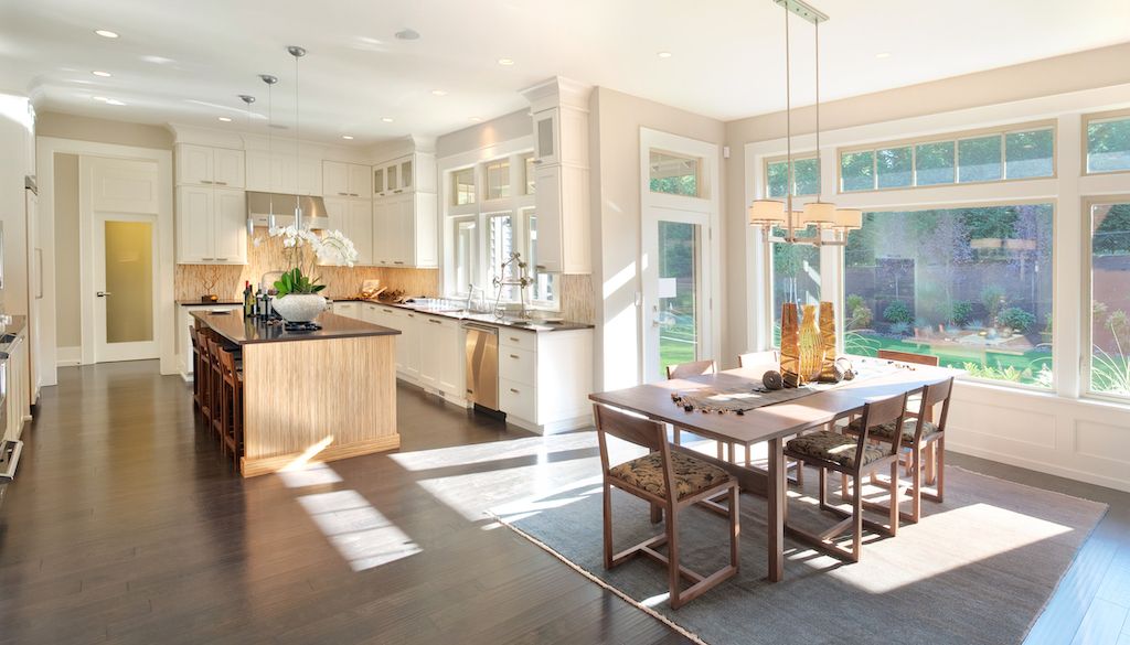 kitchen and dining room with natural light and big windows and patio doors