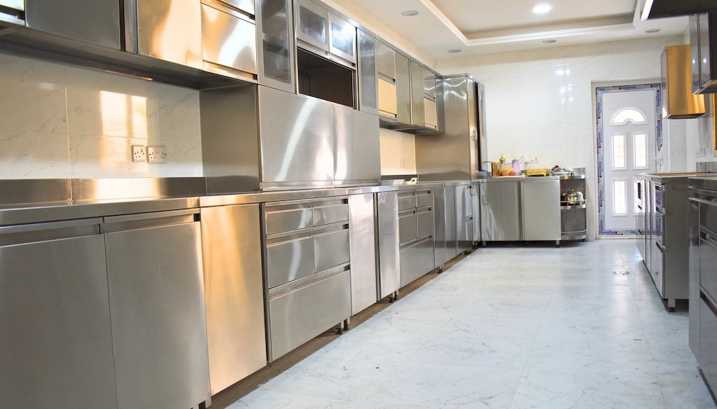 stainless steel counters and cabinets in kitchen