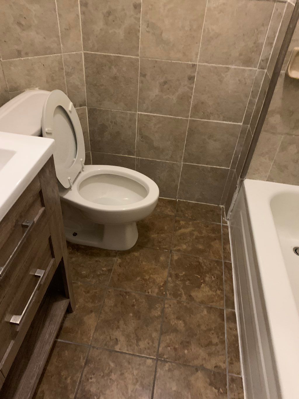Steam clean the bathroom floor and the walls