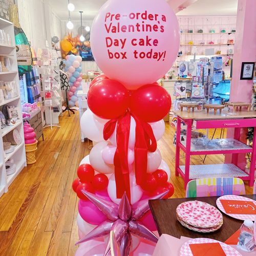 Pink Valentine’s Day balloon tower with Cricut dec