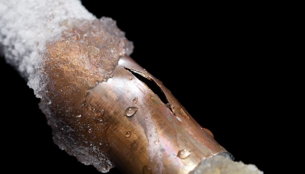 how to know if pipes are frozen: pipe bulging and breaking