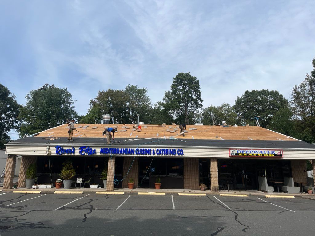 Commercial Property new shingled roof being instal