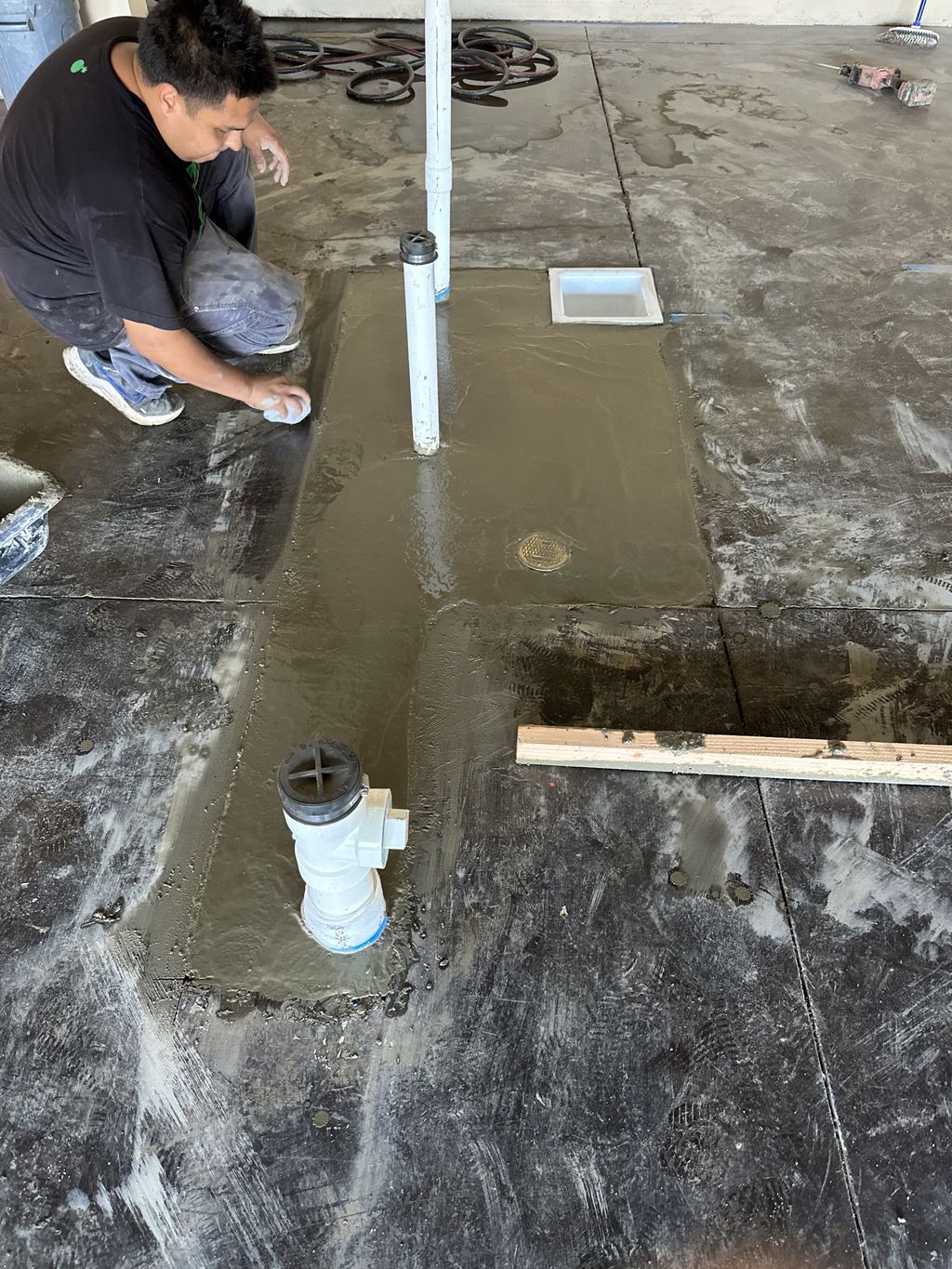 Finishing up concrete work for dog spa. 