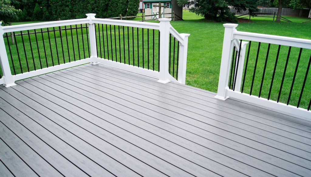 grey composite deck in backyard