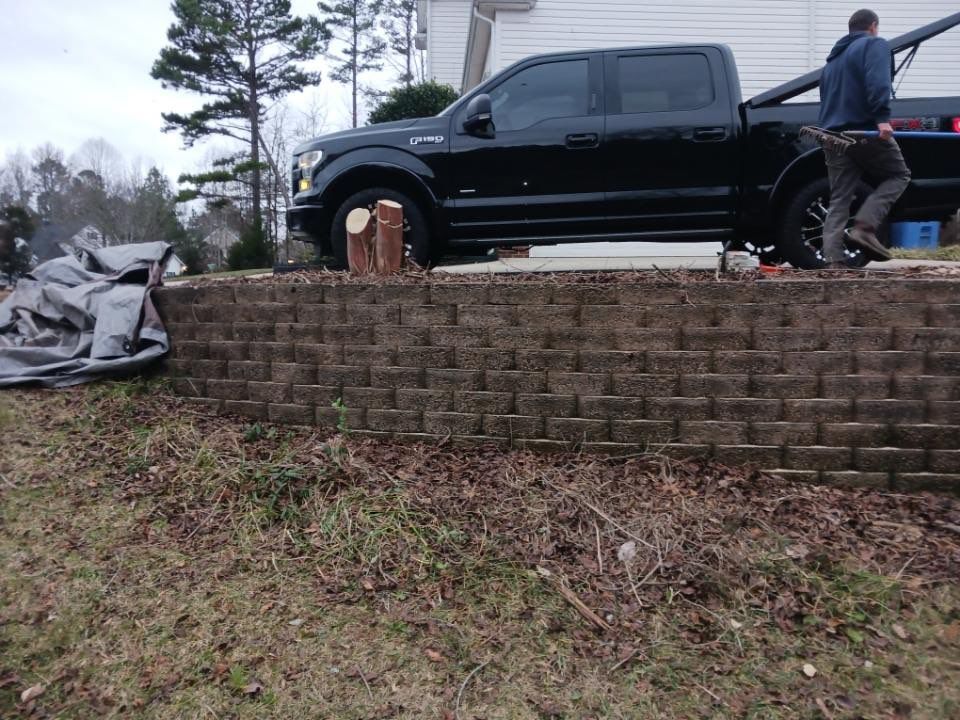 Wall built back and crape myrtles removed 
