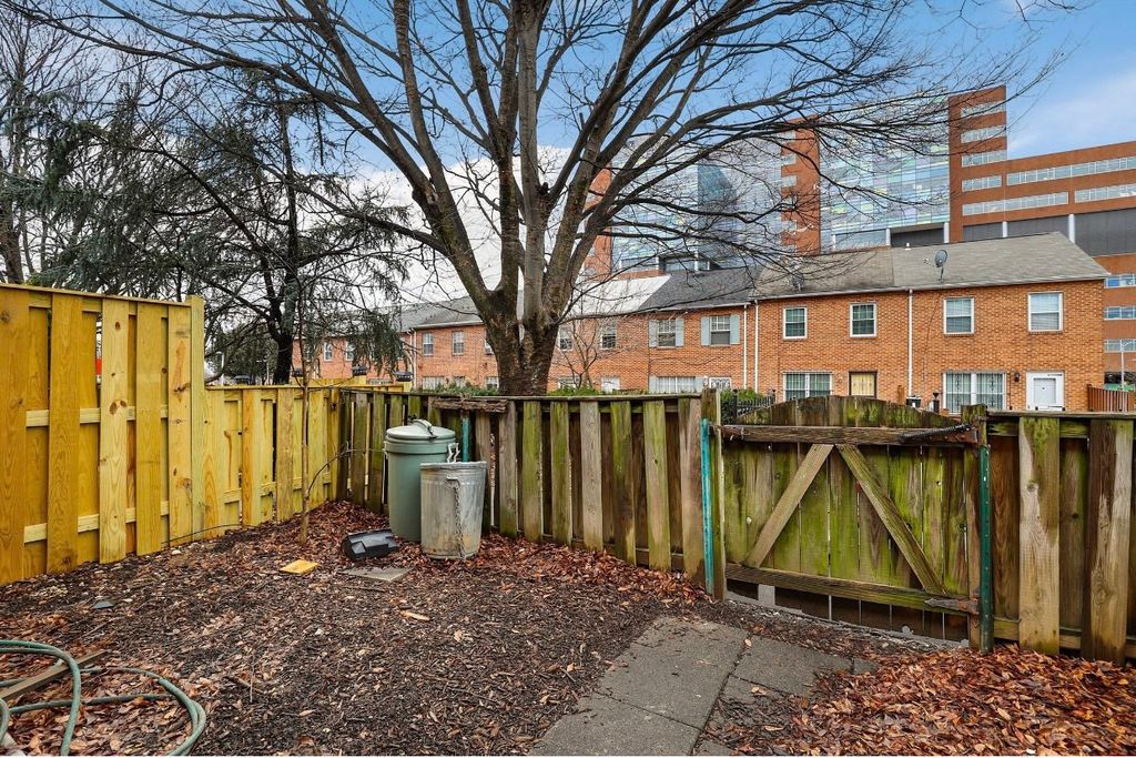 BEFORE - Rotten Wood Fence and Dirt Yard 