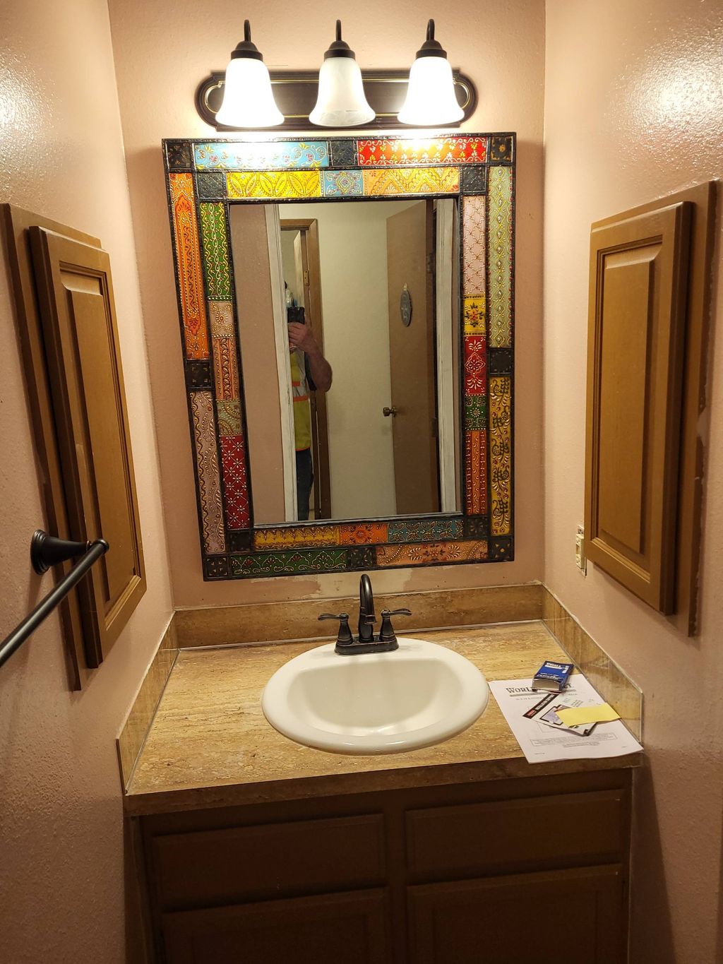 New mirror, paint, towel rack, faucet and lighting