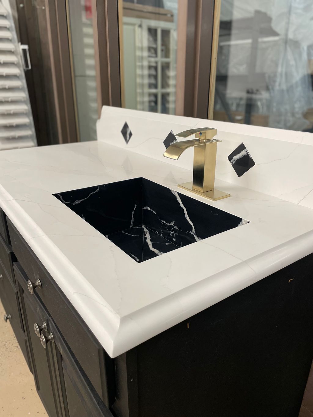 Our custom vanity with a custom built in quartz si