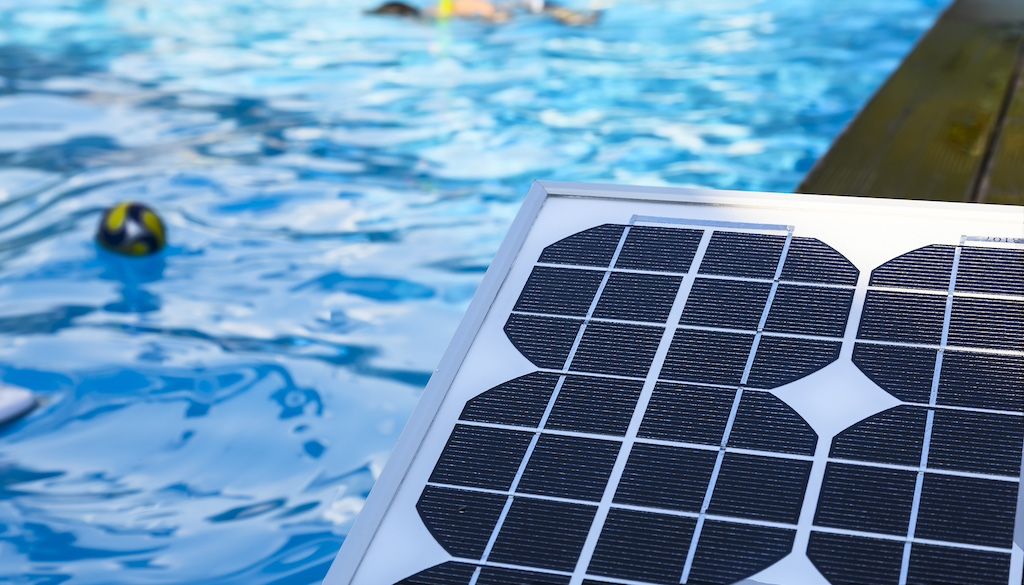 swimming pool remodeling idea: photovoltaic solar panel for heating water in the swimming pool