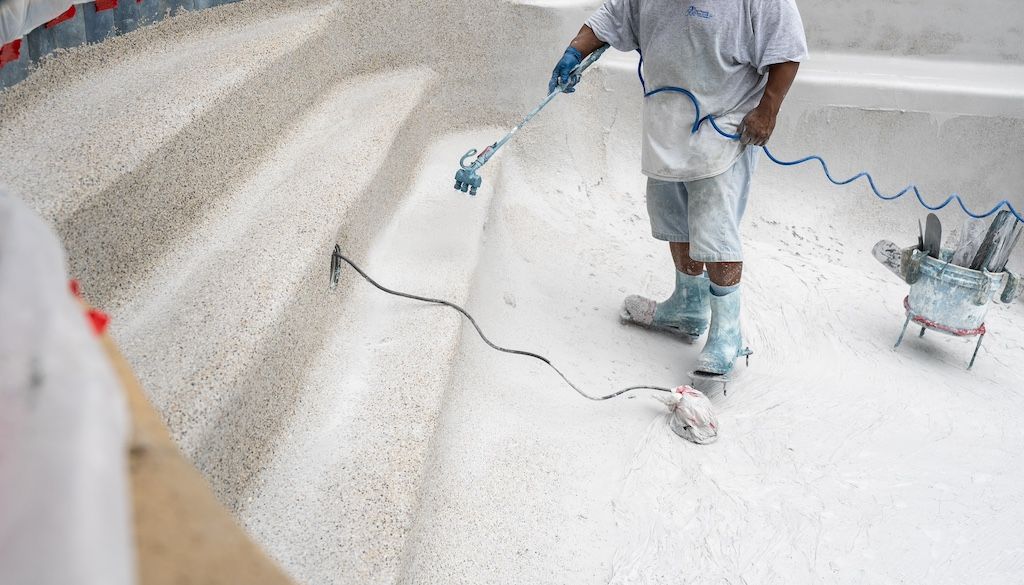 swimming pool remodeling idea: replaster and resurfacing a swimming pool during a remodel