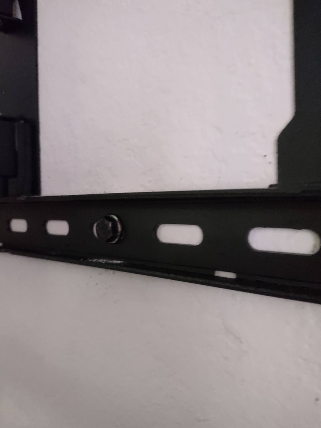 tv wall mount bolt zoomed in