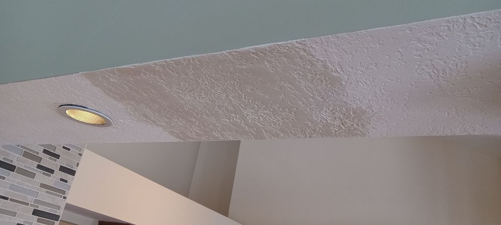 Soffit Repair and Texture Matching After.  Compoun
