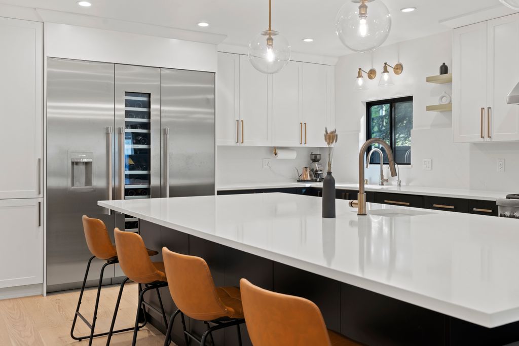 Kitchen With Chair, Kitchen Island, Refrigerator, And Sink Ideas