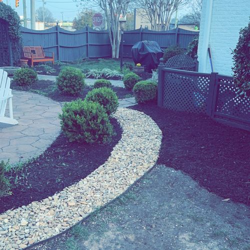 River rock bed walkway and mulch