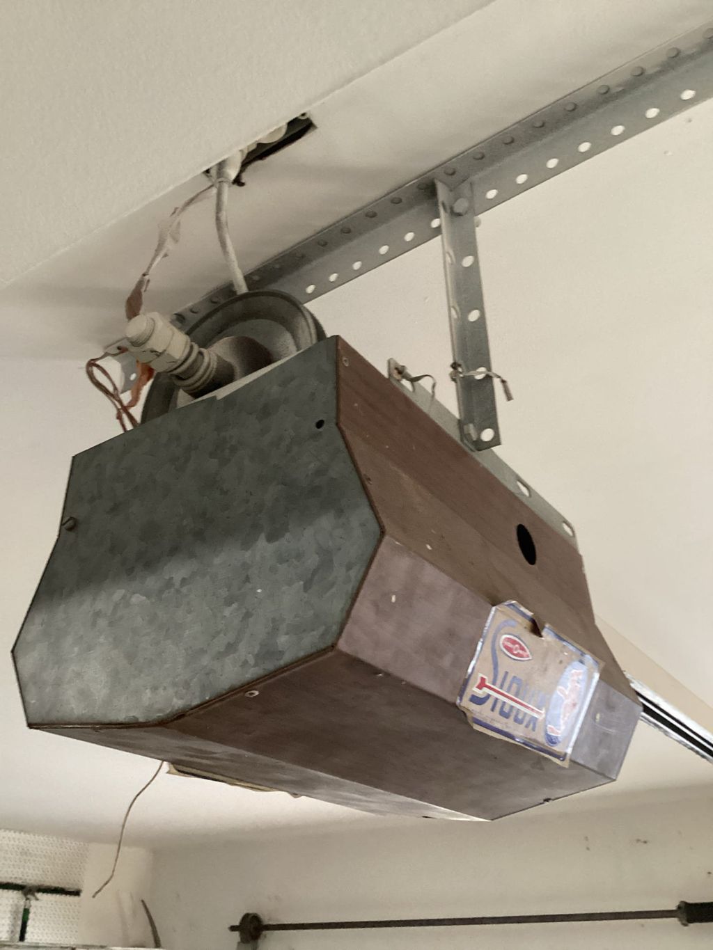 Before-Old and Broken Garage Door Opener