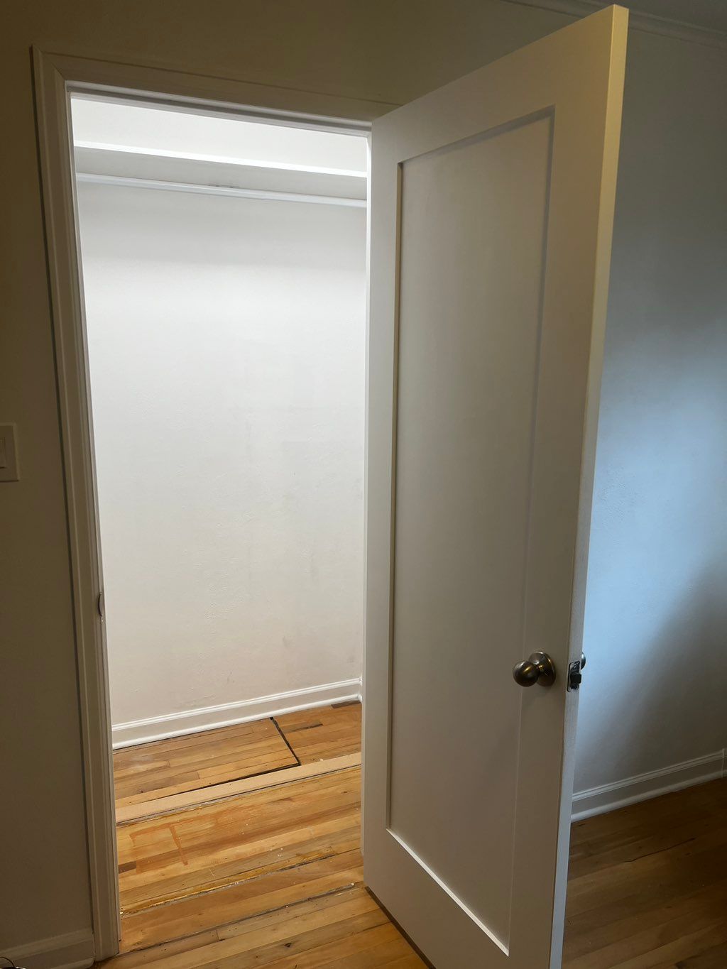 Closet after, added light, framing, drywall, door,