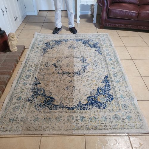 Oriental and man-made synthetic fiber rugs is one 