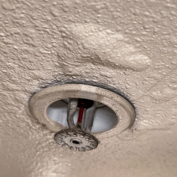 water bubbles from sprinkler leak