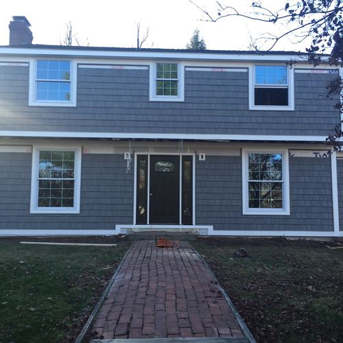 Trim replaced with azek and vinyl shake siding ins