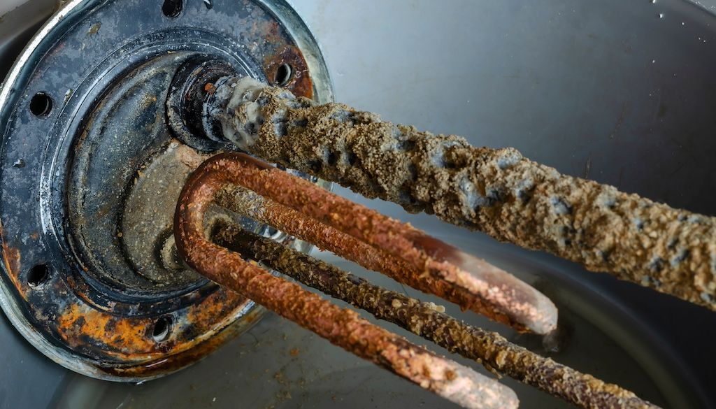 rusty and dirty water heater anode rod