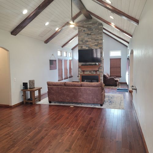 844 sq ft of hardwood flooring, painting and custo