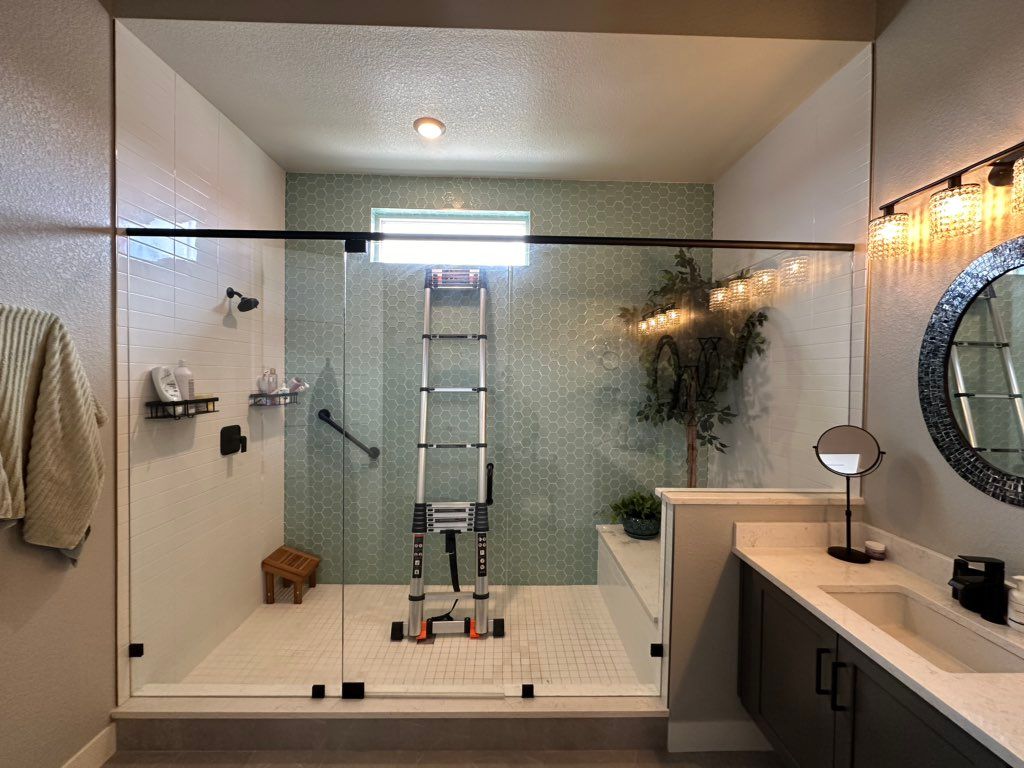 Performing bathroom glass cleaning