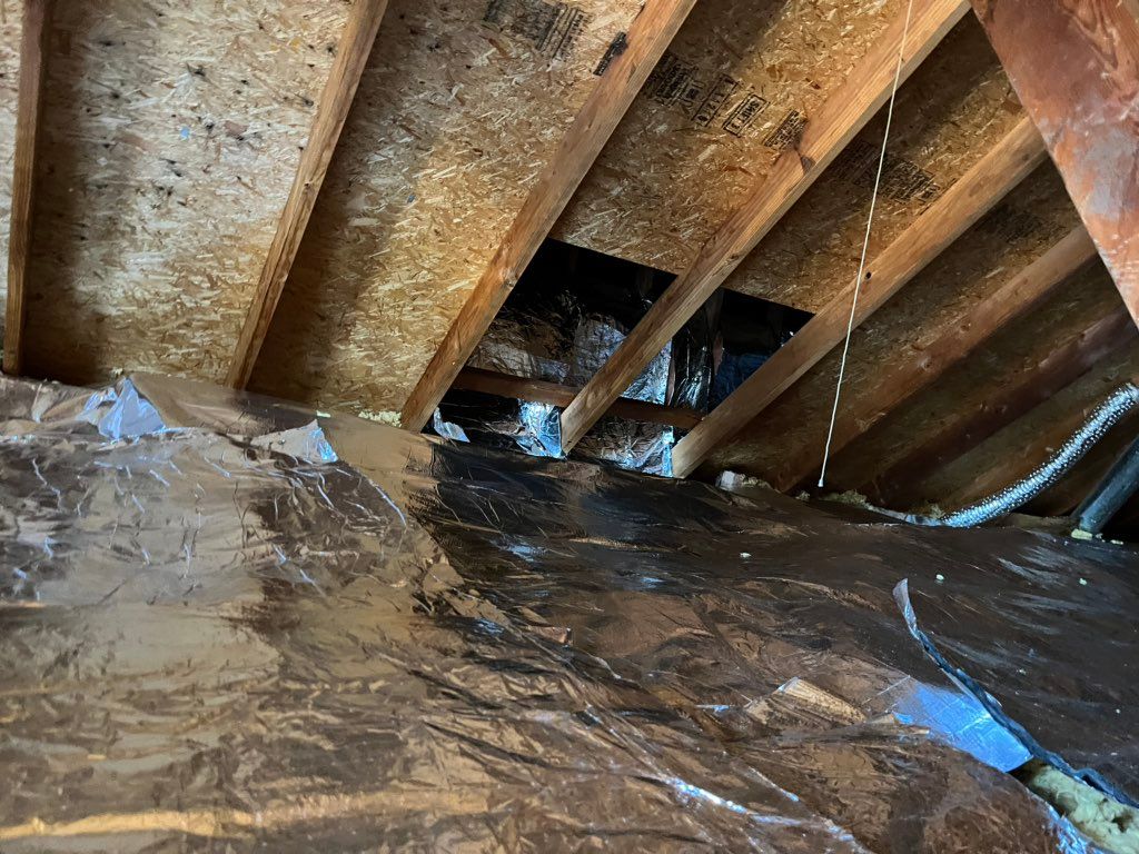 Covered attic with Reflective Insulation 