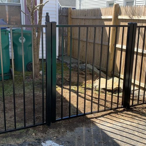 Installation of Black Aluminum Fence in Fitchburg,