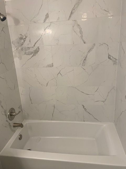 Shower after major water damage, entire bathroom r