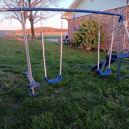 Andrew assembled our swingset and finished install
