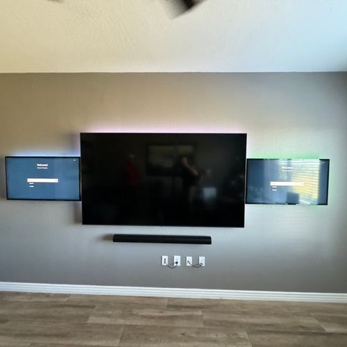 85” TV and 2 x 40” TVs on either side, LED lightin