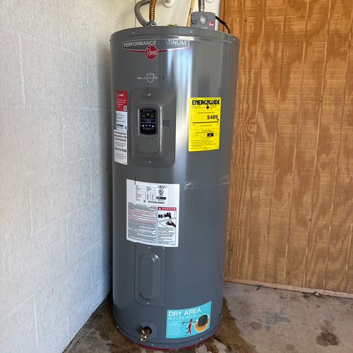 Carlos installed a water heater for us in our new 