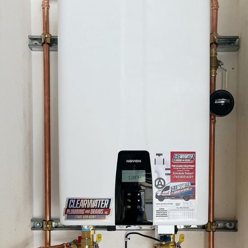 Tankless Water Heater. Space Saving and Efficient!