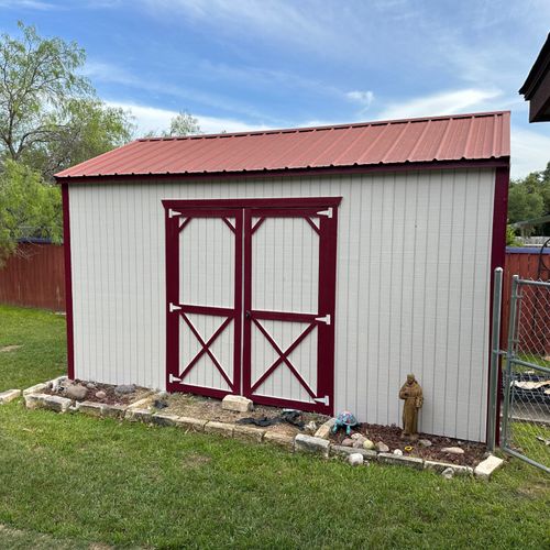 Superb job power washing and painting 2 old sheds,