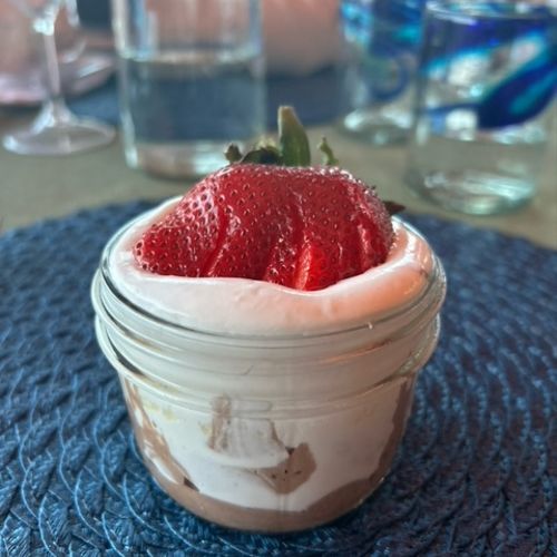 Chocolate mousse with chantilly cream and strawber