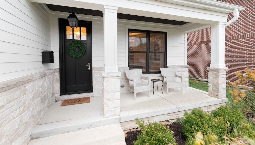 white painted concrete porch.