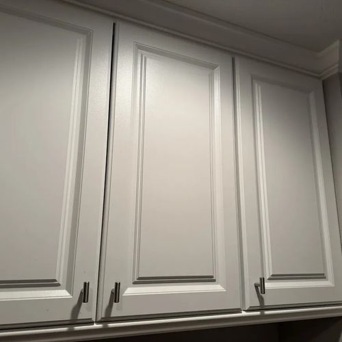Cabinet and crown moulding installation.