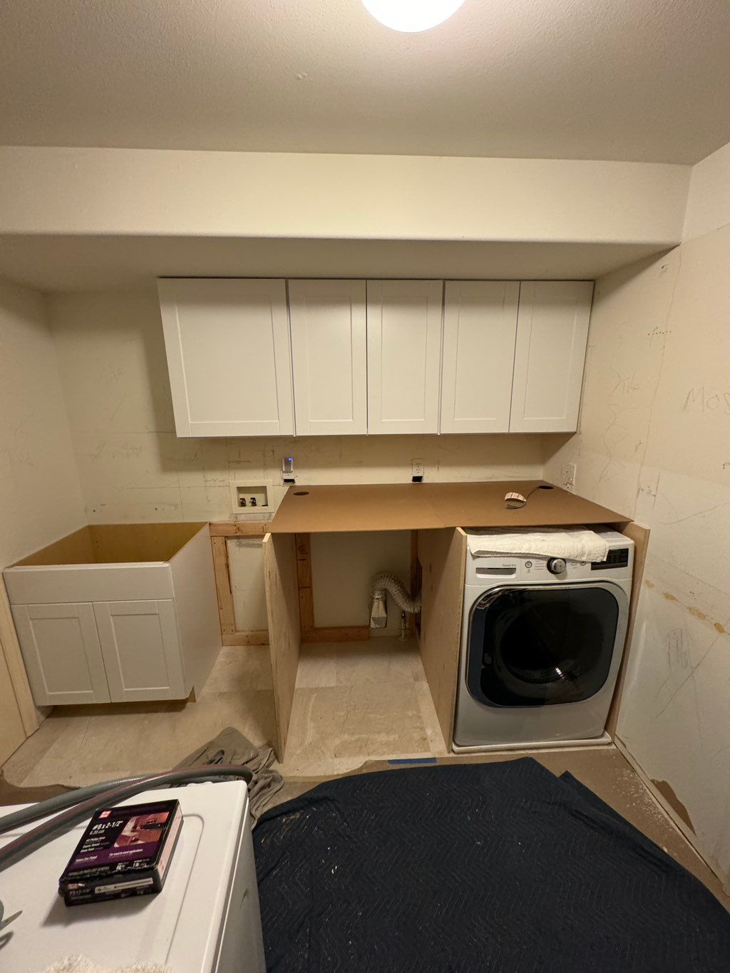 Laundry room, custom fit for the washers to have a
