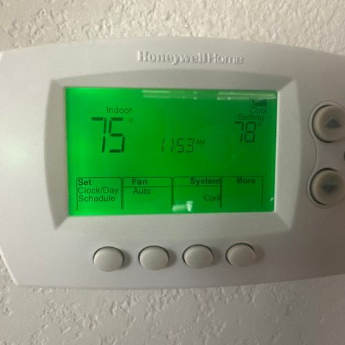 Billy replaced my old thermostat with a new WiFi-e