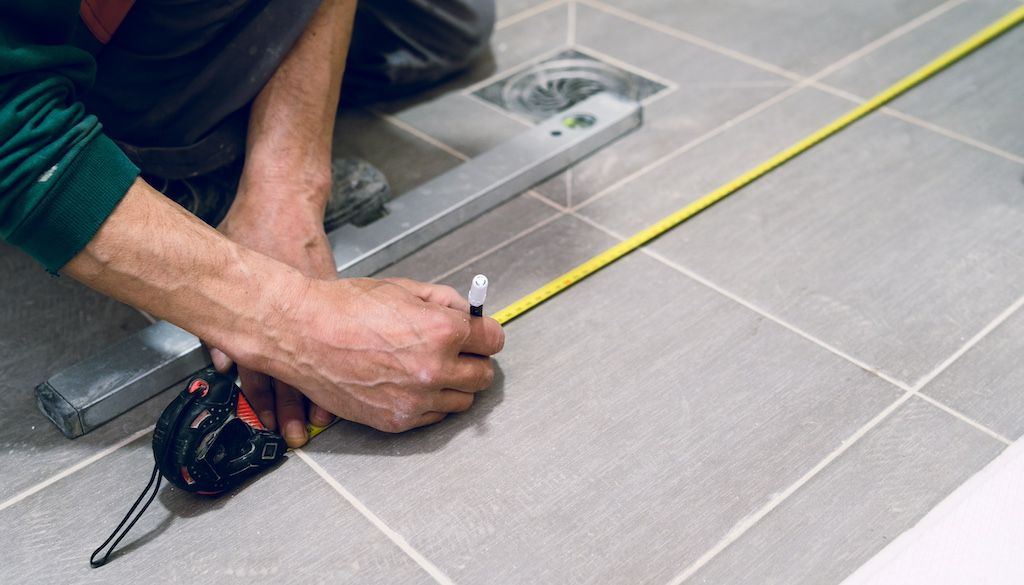 measuring bathroom tile before installation