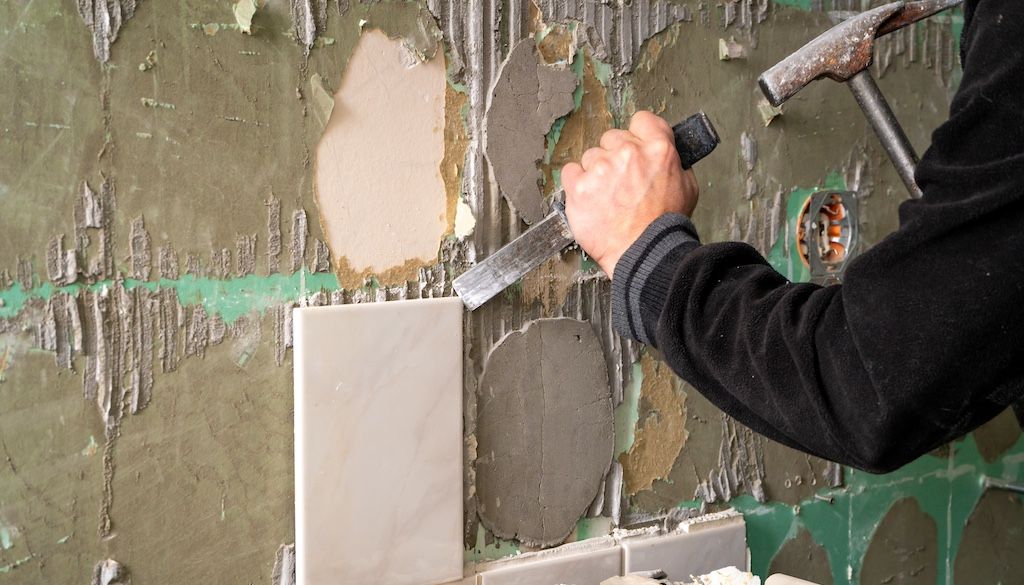 professional removing bathroom tile