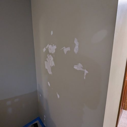 1st coat wall mud from fist sized hole and other i