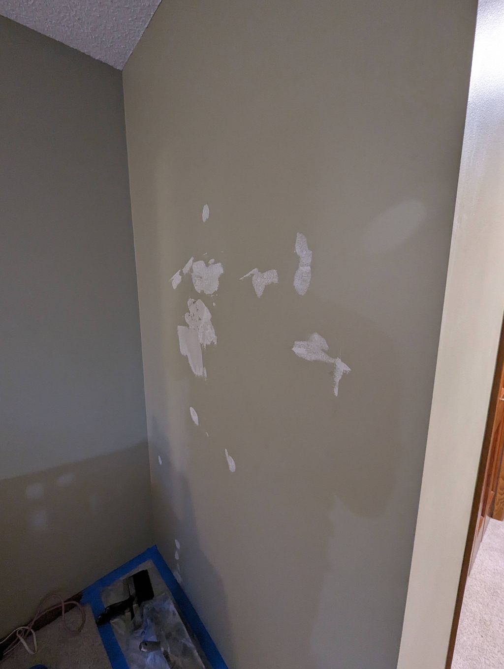 1st coat wall mud from fist sized hole and other i