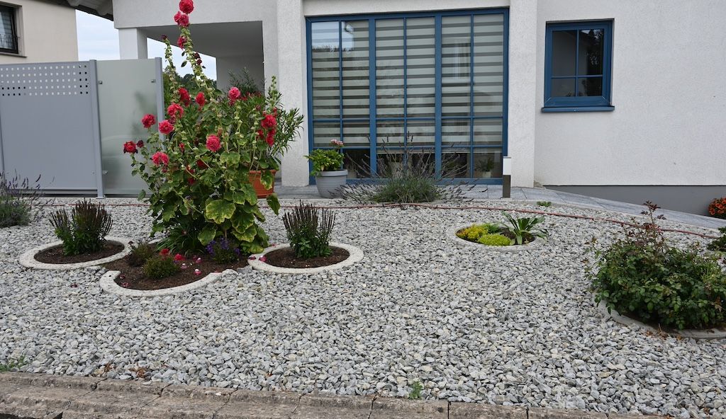 low-maintenance front yard curb appeal idea: rocks instead of lawn