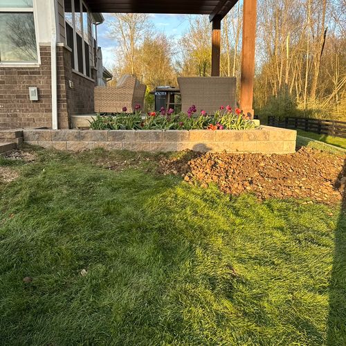 Retaining wall built for flower bed