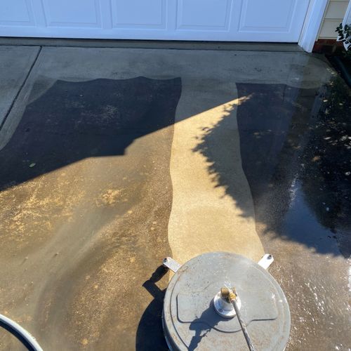 Flat surface cleaning a driveway