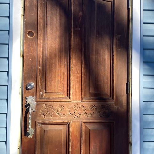 Joonwon installed an antique exterior door. He did